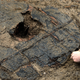 Illustration for article titled This Perfectly Preserved 3,000-Year-Old Wheel Has Been Dug Up in the UK